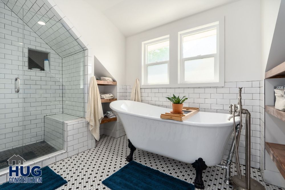 Modern bathroom remodels with a freestanding bathtub and a walk-in shower.