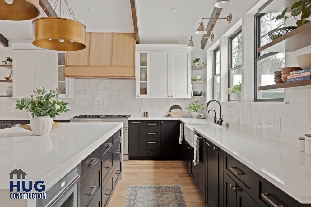 Modern kitchen interior with remodels featuring white subway tiles, dark cabinets, and wooden accents.