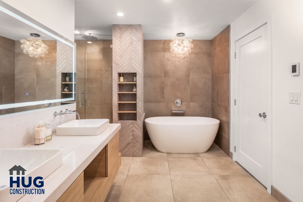Modern bathroom remodels with a freestanding tub, double vanity, and a walk-in shower.